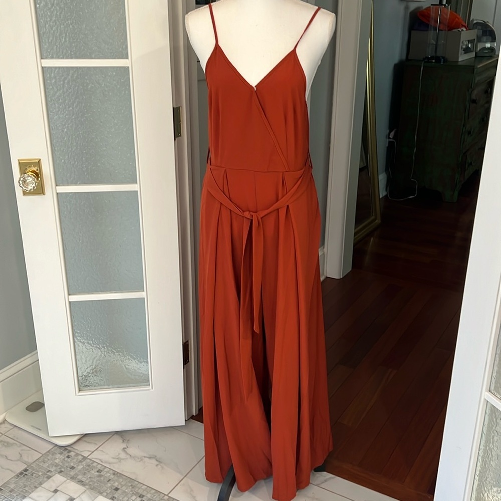 NWT rust colored jumpsuit with split leg belted